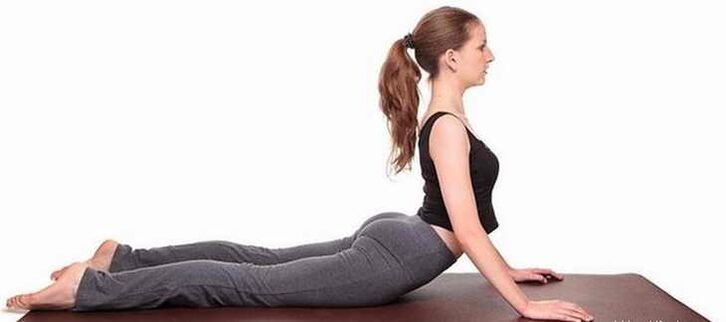 Bhujangasana pose to exercise the abdominal muscles